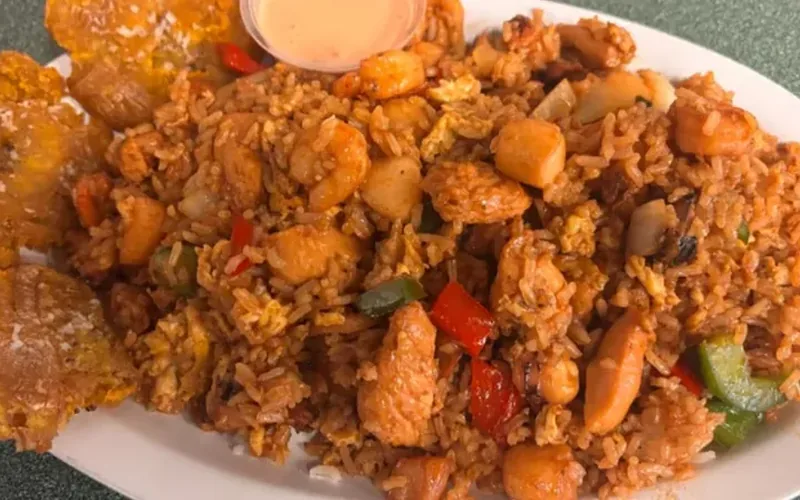 The Pay Per View seafood fried rice with tostones